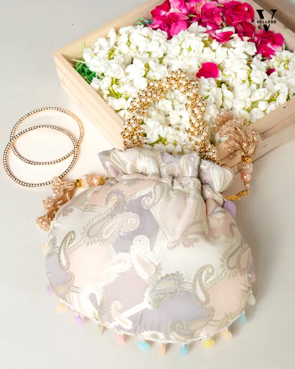 Sitara_Round_Potli_Bag_with_Pastel_Paisley_Embroidery_&_Pearl_Handle